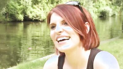 Redhead MILF talks about herself at this outdoor porn interview