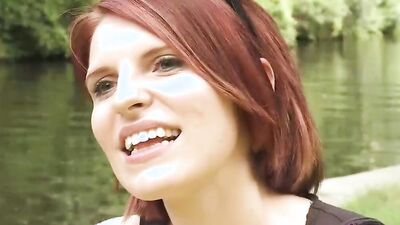Redhead MILF talks about herself at this outdoor porn interview