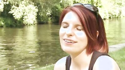 Redhead MILF talks about herself at this outdoor porn interview