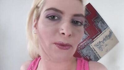 Naughty MILF poses for the camera and plays with her pussy