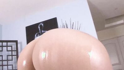 Blonde MILF is all oiled-up and fucked by a black stallion