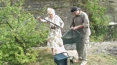 Two elderly people go fishing and find a young girl
