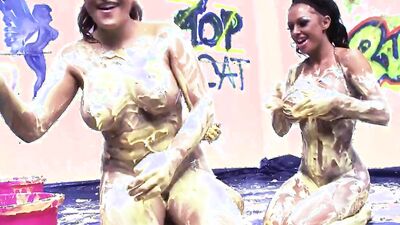 Massive boobs lesbians pour egg yolk all over themselves for a slippery and sexy pussy rub