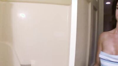 Lovely Jayden Taylors plays with her puss after the shower