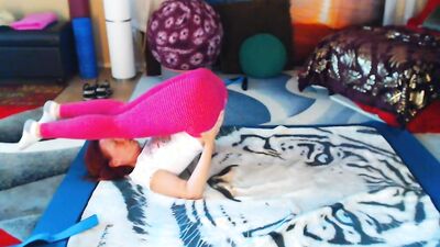 Amateur MILF is practicing some yoga in front of the camera