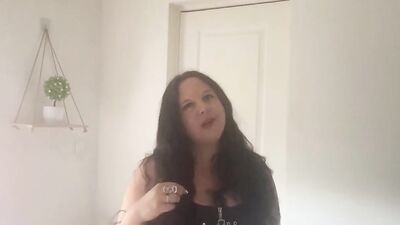 Clara is stroking her big dildo in front of the camera