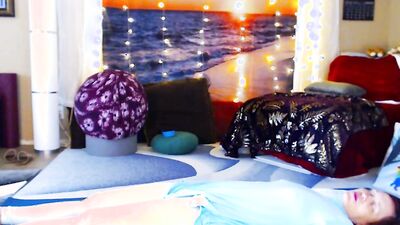 Redheaded babe is practicing yoga in front of the cam