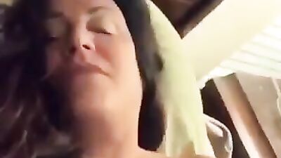 Michele rubs her wet cunt in front of the camera