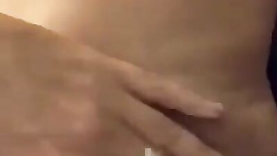 Michele rubs her wet cunt in front of the camera