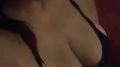 Amateur cute babe films herself while playing with her boobs