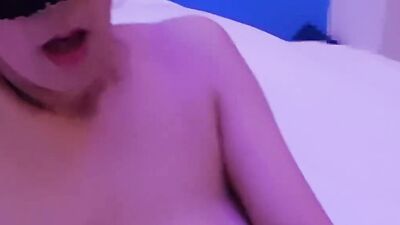 Japanese masked chick is drilling her cunt in front of the cam