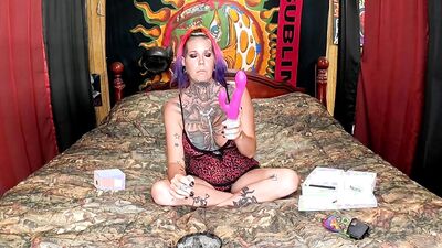Tattooed girl Chassidy Lynn is having fun in front of the camera