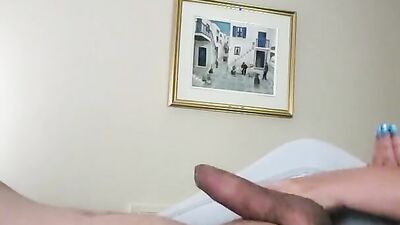 Dude films himself while stroking his hard pecker in the bedroom