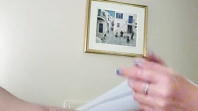 Dude films himself while stroking his hard pecker in the bedroom