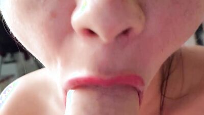 Girl wraps her pinky lips around cock in this close-up video