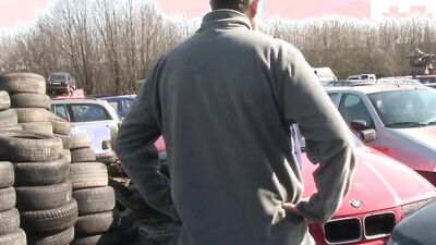 Slutty chubby MILF fucks and sucks cock on a parking lot
