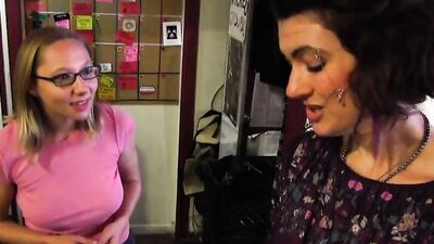Lesbian MILFs are sharing a Hitachi while licking one another
