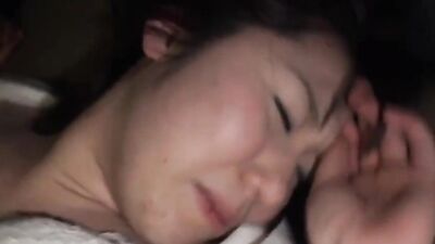 Asian woman moans loudly while a horny stepson fucks her