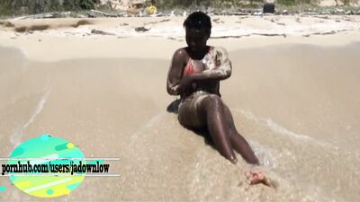 Black MILF gets horny on the beach and plays with sex toy
