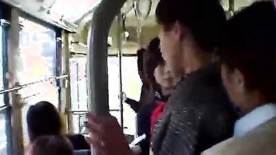 Girls grope mature milf in kimono in the bus